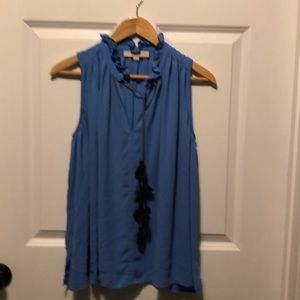 Blue pleated tank with black tie front tassels